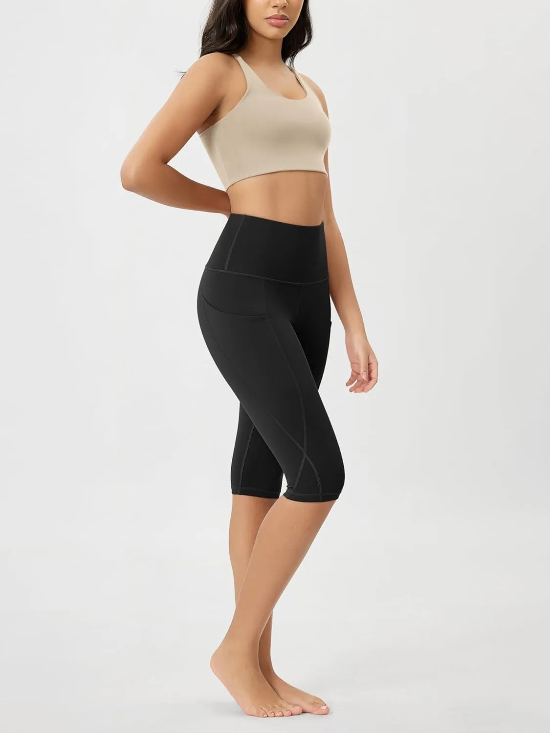 ODODOS Women's High Waisted Yoga Capris with Pockets, Tummy Control Non See Through Workout Athletic Running Capri Leggings